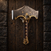 God of War Ragnarok Mjolnir replica displayed on a wooden wall
