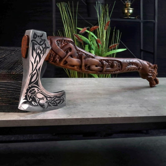 Close-up of a hand-forged high-carbon steel Viking axe blade with hammer marks